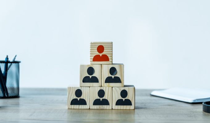 wooden cubes as human resources strategy near stationery on desk